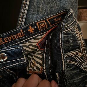 Rock Revival Blue Boot Cut Jeans with Distinctive Stitching